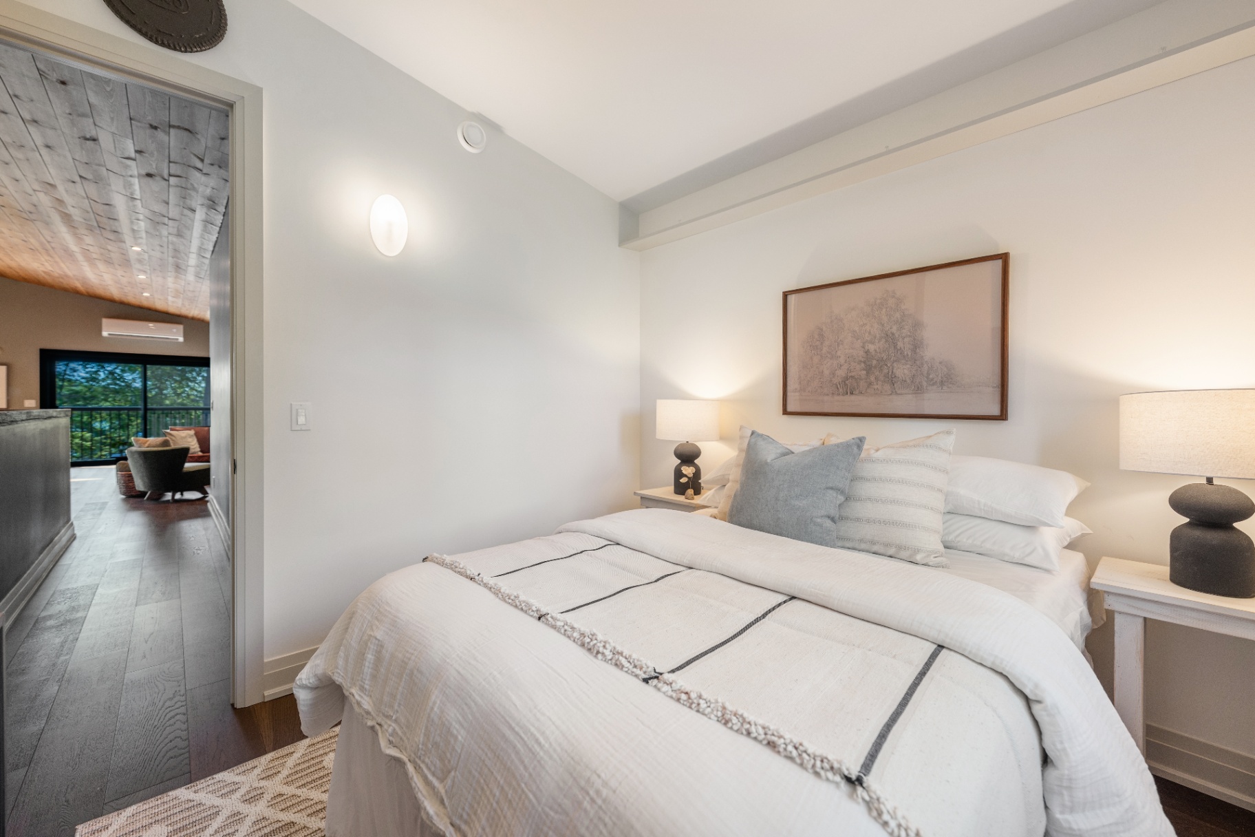 Guest bedroom opening to the upstairs loft