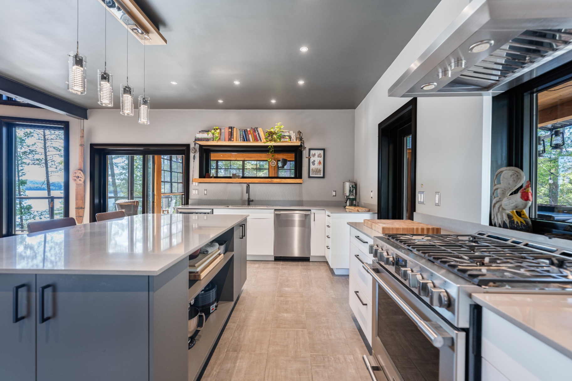 Galley kitchen with double island and lake views